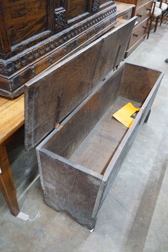 A 17th century oak six plank coffer, length 130cm, depth 37cm, height 58cm